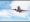 White passenger airplane flying in the sky amazing clouds in the background - Travel by air transport